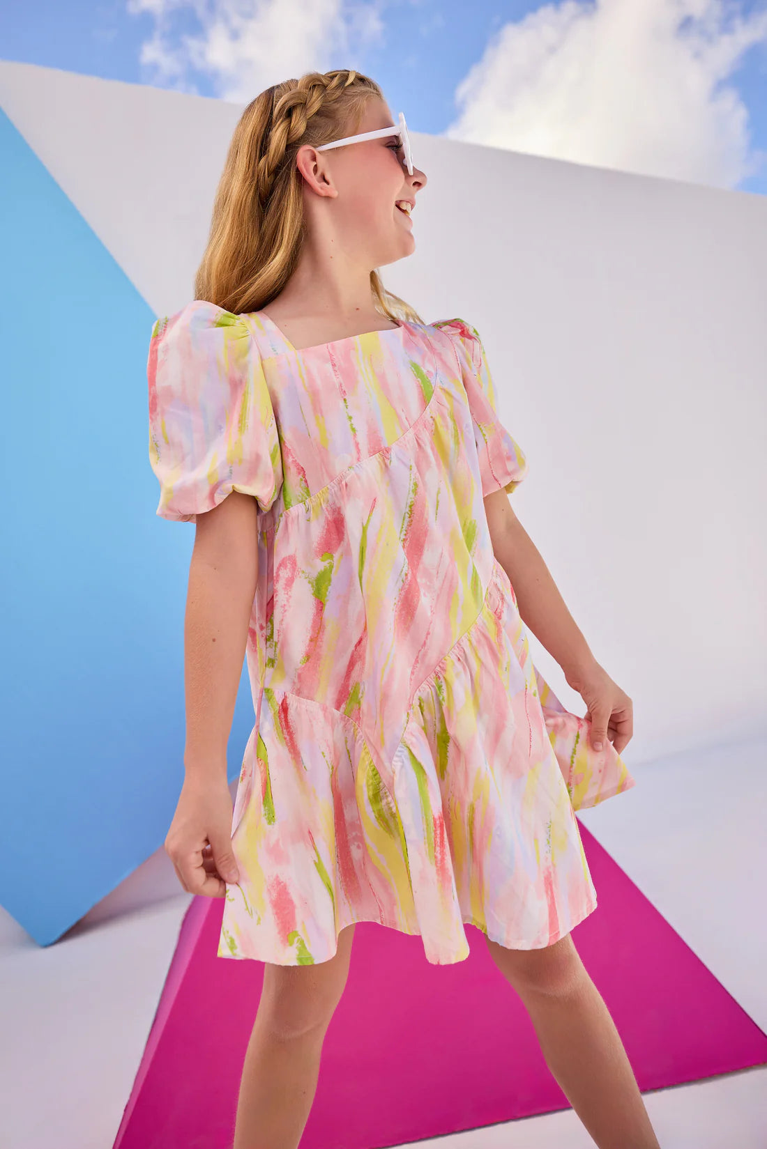 Our eye-catching Asymmetrical Dress is sure to turn heads this Spring and Summer! Featuring a fun asymmetrical neckline, your BISBY girl will reach for this dress every time! The elastic cuff sleeves and asymmetrical neckline is an elevated look you can only find here at BISBY!