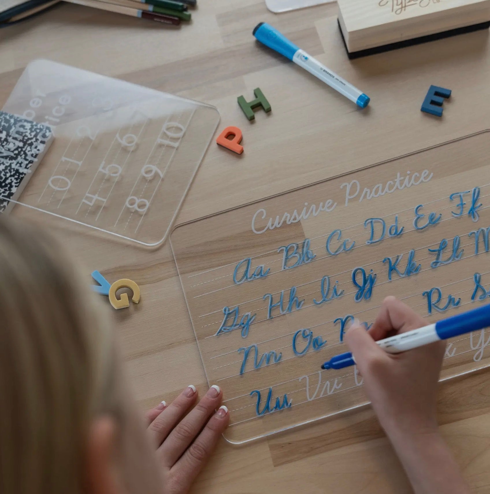 Perfect for ages 7+, our Cursive Tracing Board is designed to help young learners build confidence as they master the art of cursive handwriting. Featuring a full alphabet in uppercase and lowercase cursive, this screen-free practice tool encourages fine motor development, utensil control, and phonics-based learning.