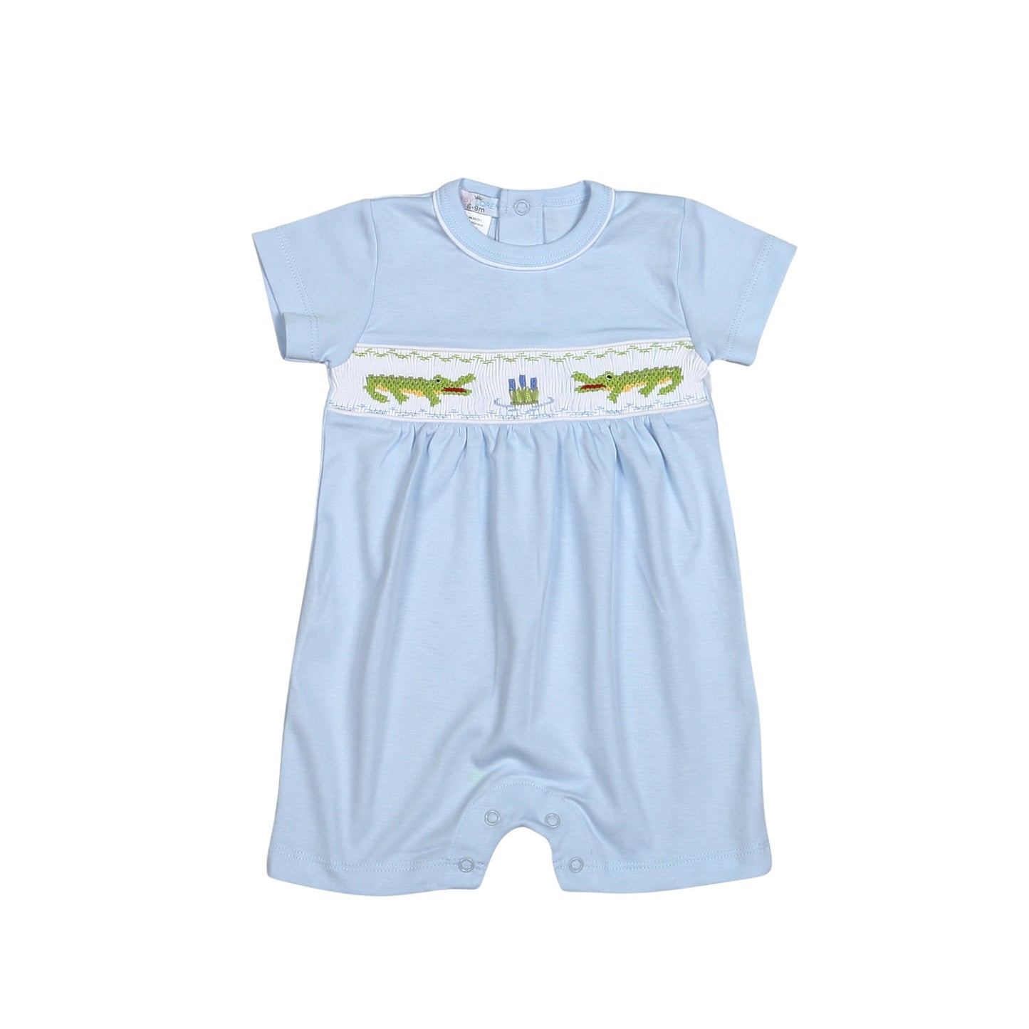 Get ready for some serious dino-mite cuteness with our Alligator Blue Hand Smocked Pima Jon Jon for baby boys! Crafted with care and adorned with a playful hand smocked alligator design, this jon jon is the perfect mix of comfort and charm. Perfect for any occasion, your little one will be the talk of the town!