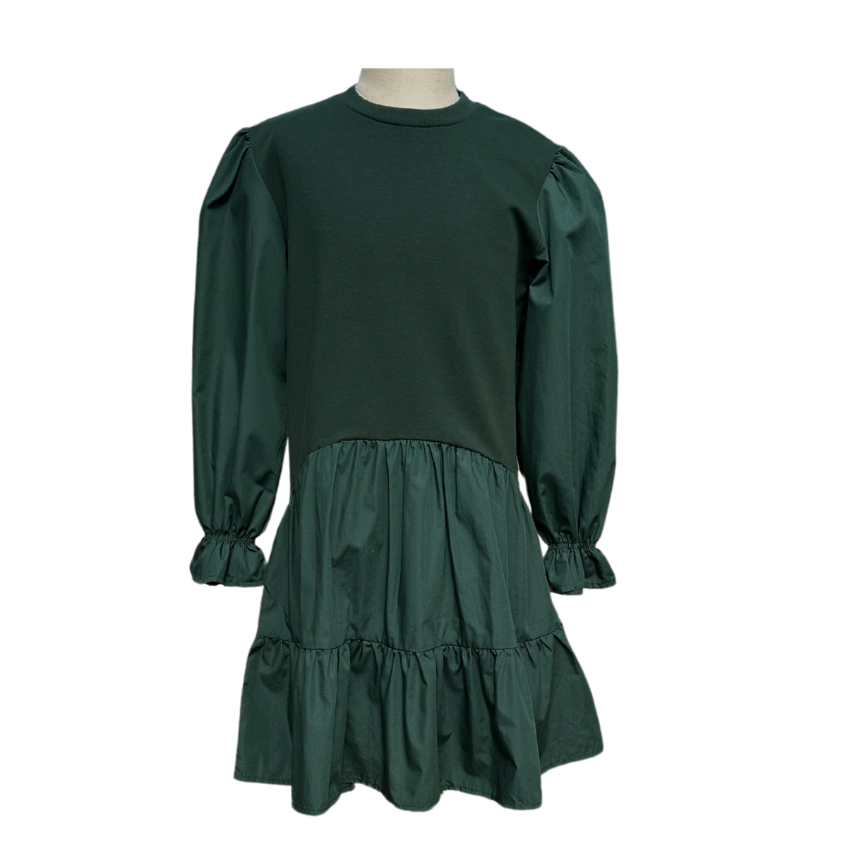 This combo dress is closet staple! Her sweatshirt bodice mixed with her poplin sleeves and skirt create an elevated look that&