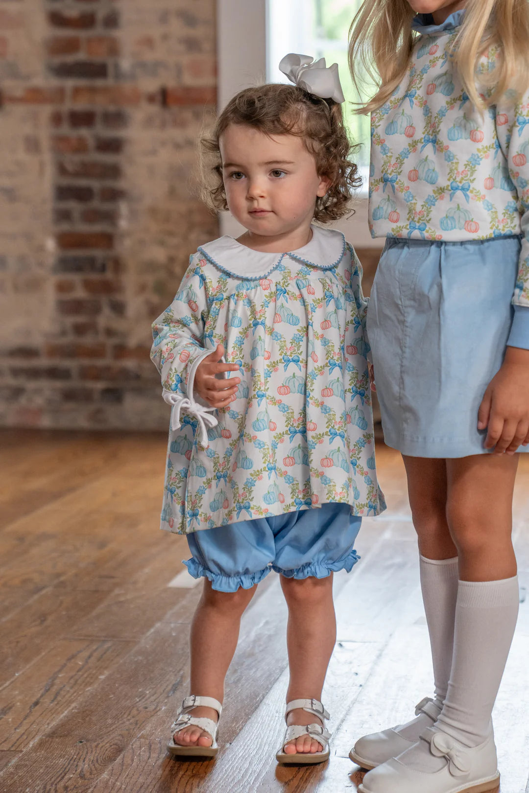 Get ready for pumpkin season with the Mary Charlotte Pumpkin Bow Bloomer Set. This best-selling set features a sweet new print and is perfect for pumpkin patch adventures. Say hello to Fall in style! Coordinates with the Presly Kait Pumpkin Bow Dress, Mary Reese Pumpkin Bow Dress, and the Pumpkin Bow Sweatshirt!
For best results, wash on gentle and lay flat to dry.