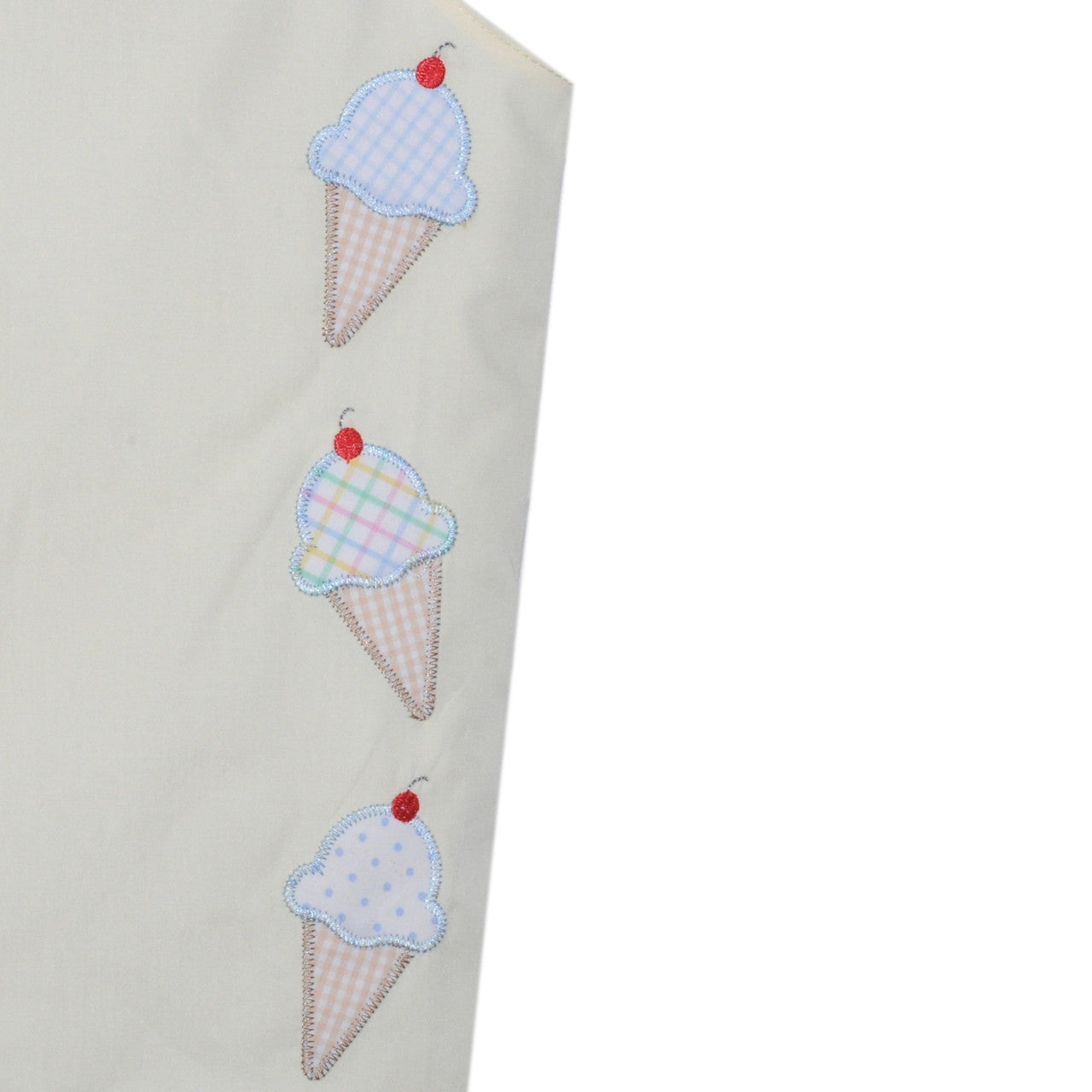 Sweeten the season with our Hayes Shortall, embroidered with a trio of colorful ice cream cones on buttery pastel yellow. Designed for your little guy’s warm-weather adventures, this set is crafted in lightweight cotton with easy button straps and inner leg snaps for quick changes. Whether it’s a trip to the park or a birthday bash, this shortall serves up smiles by the scoop.