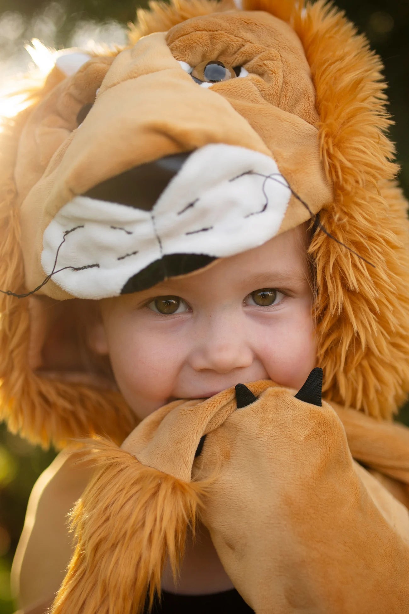 Get ready to rule the jungle in our Woodland Storybook Lion Cape. Little lions will love this soft and cuddly cape complete with lion hood and built-in-paws.