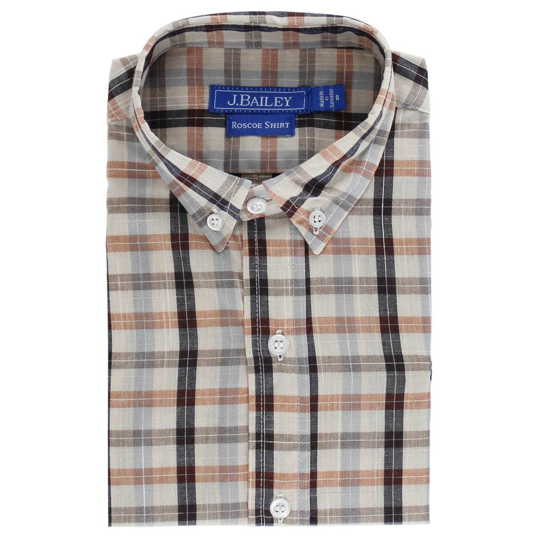 The Charleston Button-Down features a lively preppy plaid in soft cotton. Easy to dress up or down, it transitions seamlessly from school to special occasions with Southern charm