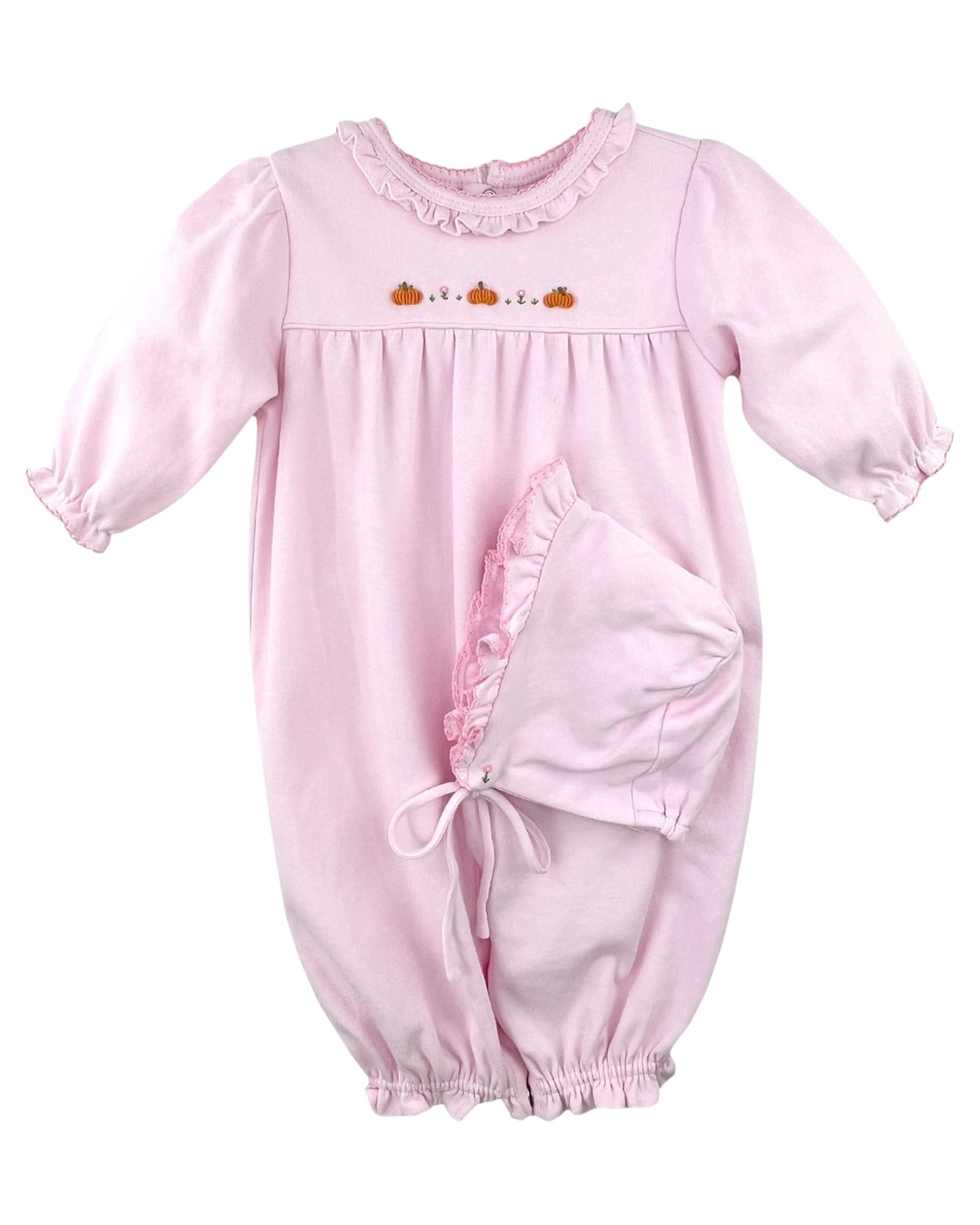 This beautiful knit convertible bag set is soft and comfortable, made with 100% cotton this outfit is perfectly soft for baby!

Featuring a delicate bullion embroidered pumpkins that is perfect for babies first trip to the pumpkin patch. Comes in a soft and delicate light pink fabric with sweet ruffled trim for added detail. This 100% cotton knit bag converts with snaps into a longall for two outfits in one. A matching hat is also included. 