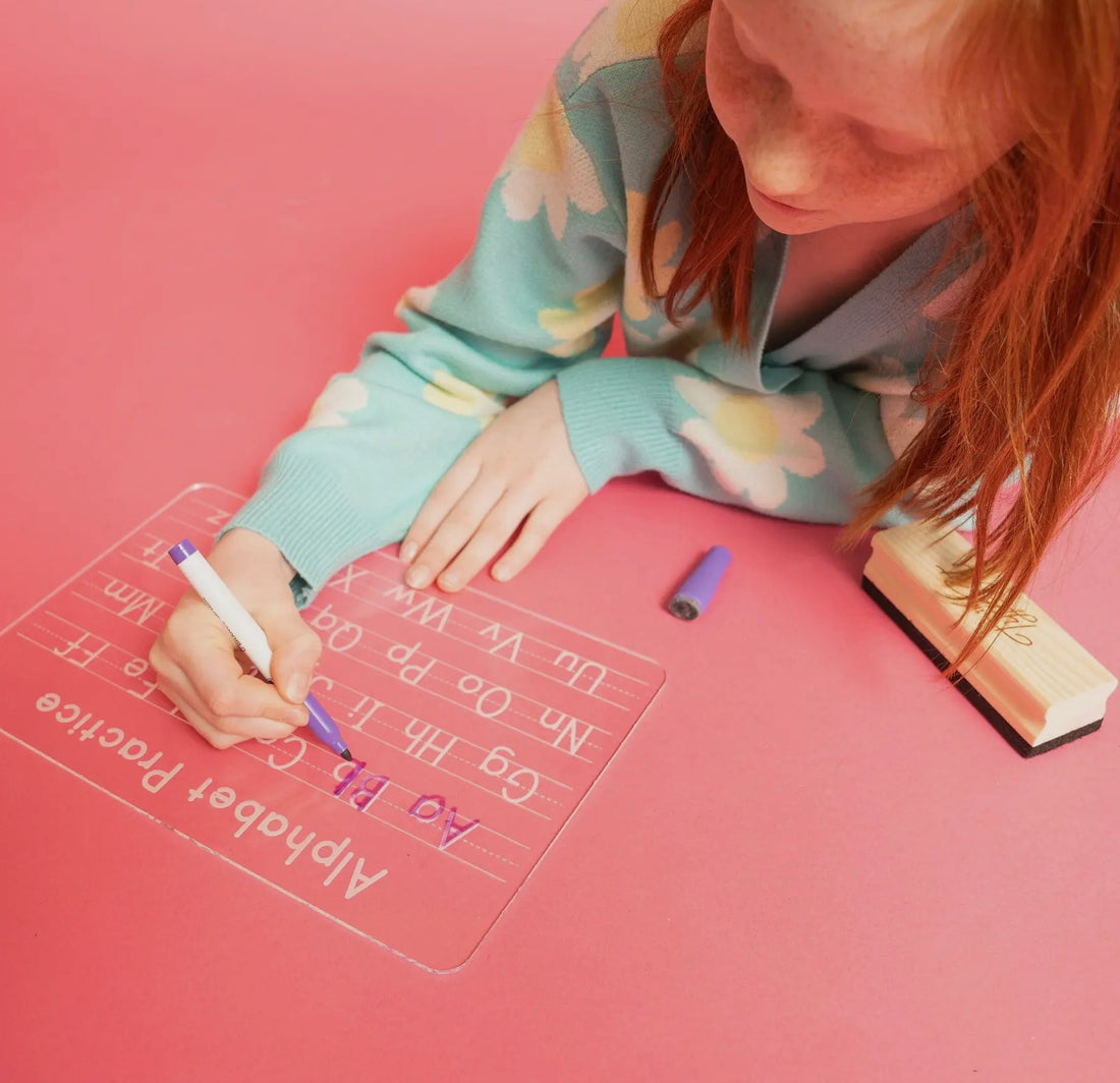 A customer favorite, our Alphabet Tracing Board is a smart, screen-free solution parents love. Designed to help kids ages 4+ practice letter formation, develop fine motor skills, and build confidence in early writing-this acrylic board is a classroom-worthy tool made stylish for modern families.