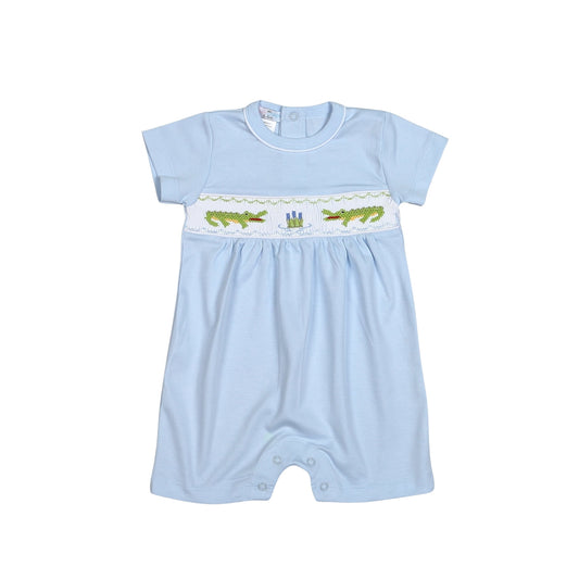 Get ready for some serious dino-mite cuteness with our Alligator Blue Hand Smocked Pima Jon Jon for baby boys! Crafted with care and adorned with a playful hand smocked alligator design, this jon jon is the perfect mix of comfort and charm. Perfect for any occasion, your little one will be the talk of the town!