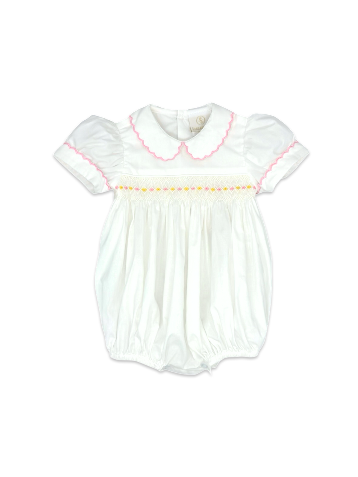 The Belle Bubble is a classic piece designed with heirloom-quality details. Crafted from soft white batiste, this charming outfit features delicate light pink and yellow smocking across the chest. A Peter Pan collar and sleeves piped in light pink add a refined touch, making it perfect for special occasions, portraits, or everyday elegance. Lightweight and breathable, this bubble ensures both comfort and style for your little one.