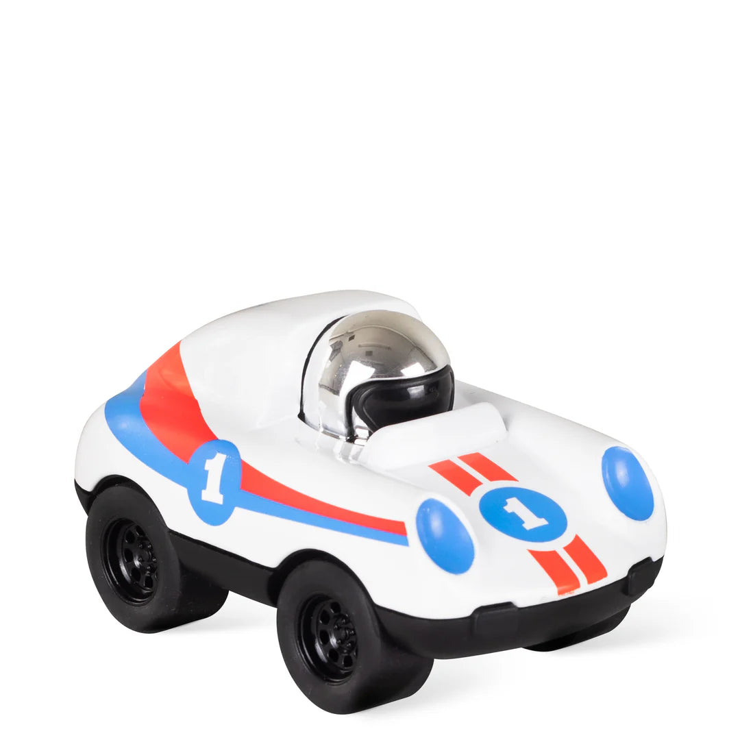Hey, presto! This turbo-speed, battery-free retro mini racing car is ready to roll! Kids will have a hoot racing these nimble little diecast Racers, activating the racing mechanism with a simple push-down, and they’re off! In three fun and collectable designs.