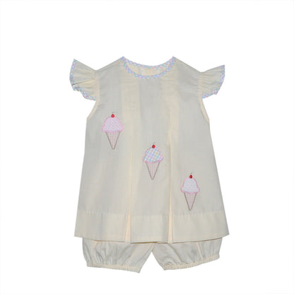 Scoop up something sweet with the Reesee Bloomer Set! This darling outfit features a flutter-sleeve top in pastel yellow, delicately embroidered with adorable ice cream cones in soft sherbet shades. Paired with matching bloomers for an easy, breezy outfit that’s as cute as it is comfy. A must-have for the girly girl who loves sprinkles and sunshine.