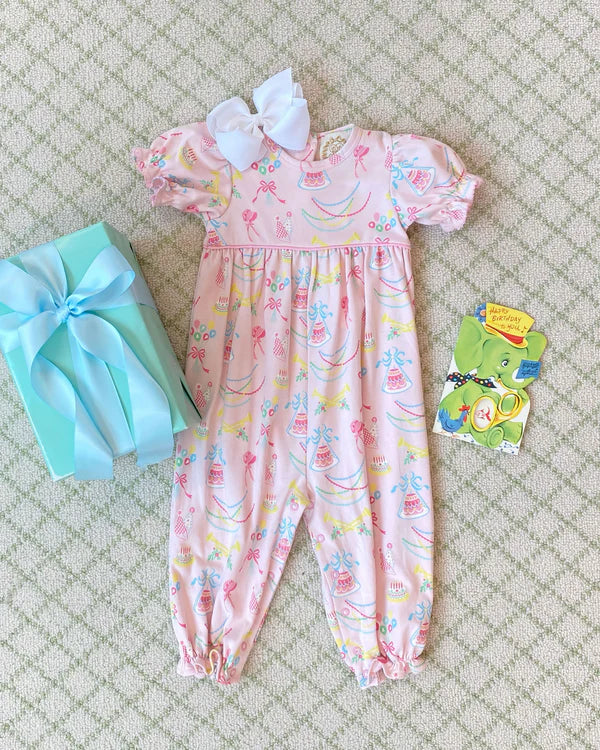 The Short Sleeve Britt Romper in Golden Birthday with Pier Party Pink is too cute for all of your little girl&