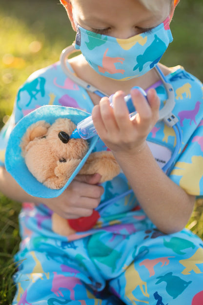 The vet is in! The adorable Veterinarian Set includes Scrubs: Shirt and Pants, Mask, Plush Puppy with removable Cone, Syringe with working plunger, Stethoscope, and a Name Card. Fully accessorized to play animal doctor your child will love taking care of plush animals! Taking care of your stuffed animals is the perfect way to nurture and develop compassion in young children, and it’s a fun and engaging way when suited up with these colourful animal print scrubs and realistic-looking accessories. 